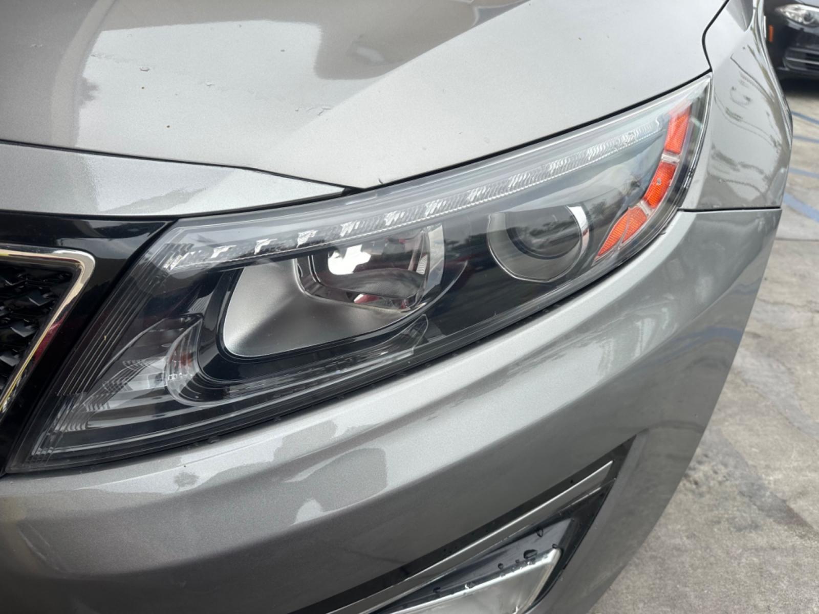 2014 Gray /BLACK Kia Optima SX Turbo (5XXGR4A62EG) with an 2.0L L4 DOHC 16V TURBO engine, 6-Speed Automatic transmission, located at 30 S. Berkeley Avenue, Pasadena, CA, 91107, (626) 248-7567, 34.145447, -118.109398 - New tires! Moon Roof! Nice Interior! Looks and drives good! Bad credit? We can help! We are the bank. All our cars are thoroughly inspected and reconditioned by our technicians. FREE CARFAX report. Stop by or call to speak with our friendly staff. Whether you have bad credit, no credit, bankruptcy, - Photo #8